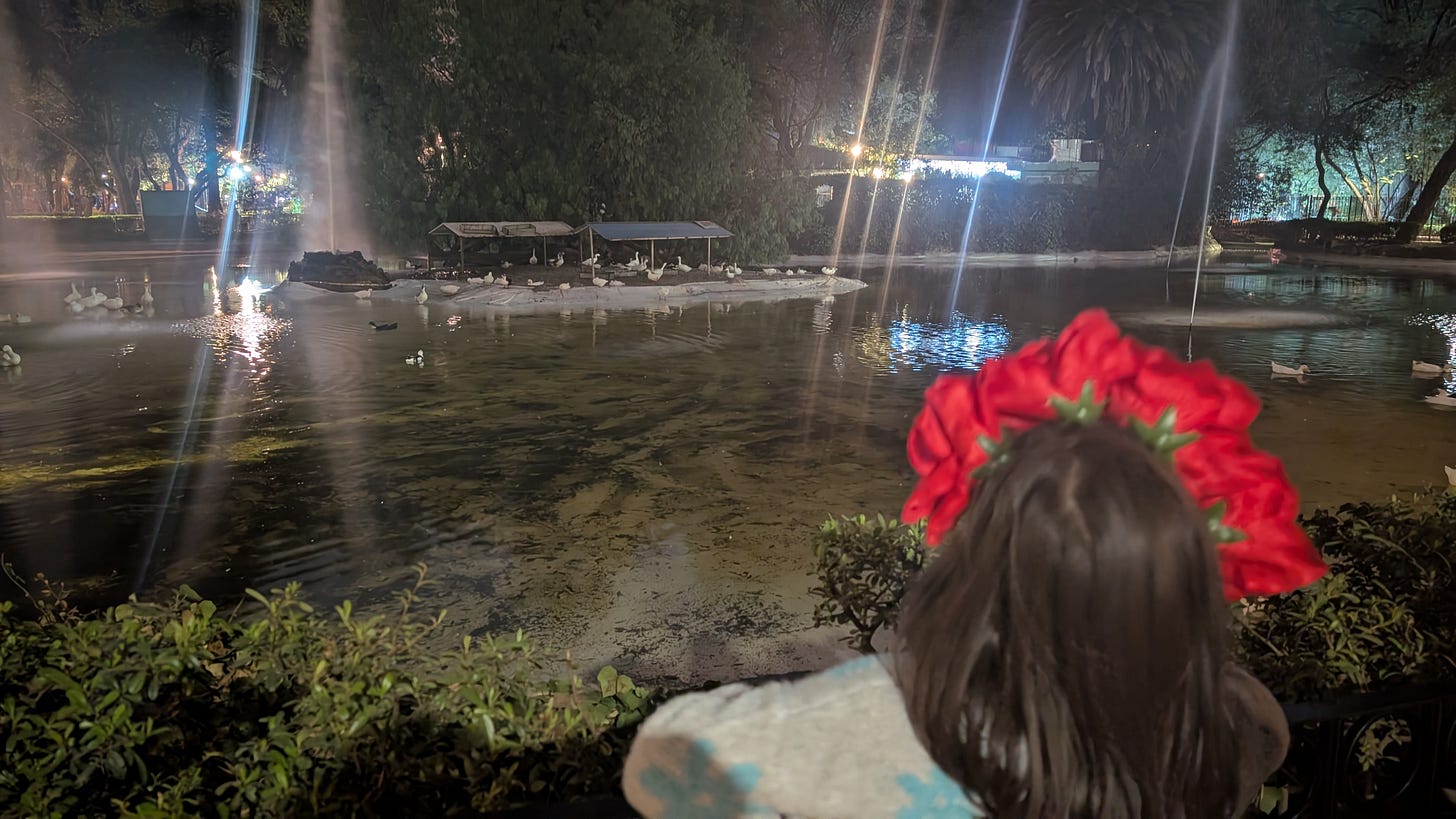 Enjoying one of the plazas at night, trying to convince ourselves we're not that tired.