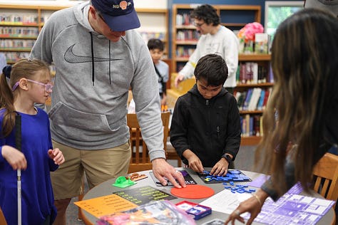 Nine square images from STEM Day, including two students 3d designing, a student sharing his Mars Rover Scratch game, a little kid building with MOLA kit, 3D-Click activities, Tiny robots!, Exploring resources