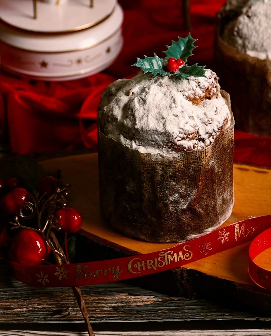 A table topped with cakes covered in frosting