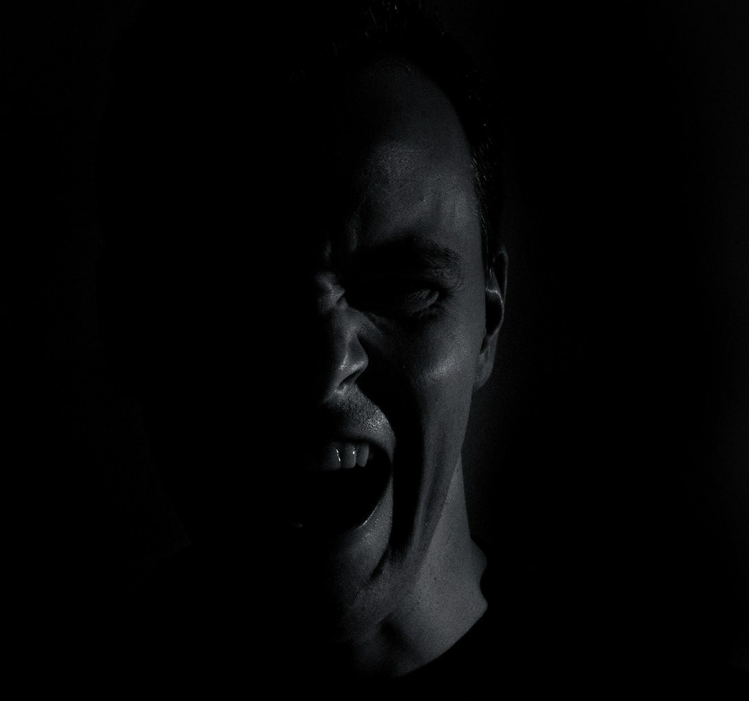 womans face in grayscale