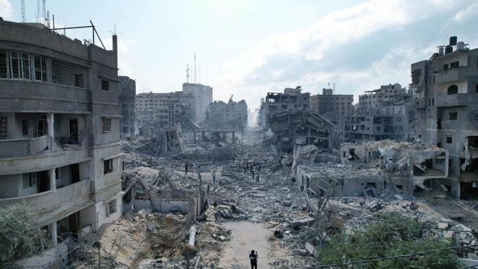 A person standing in front of a destroyed city

AI-generated content may be incorrect.