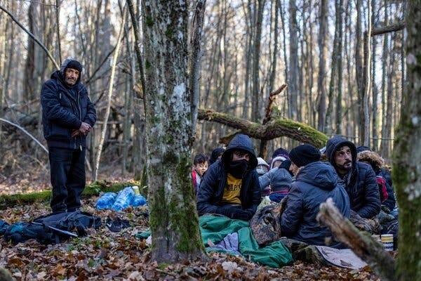 Members of a Kurdish family from Iraq waiting this week for border guard patrol on the Polish side of the border with Belarus. Members of a Kurdish family from Iraq waiting this week for border guard patrol on the Polish side of the border with Belarus.
