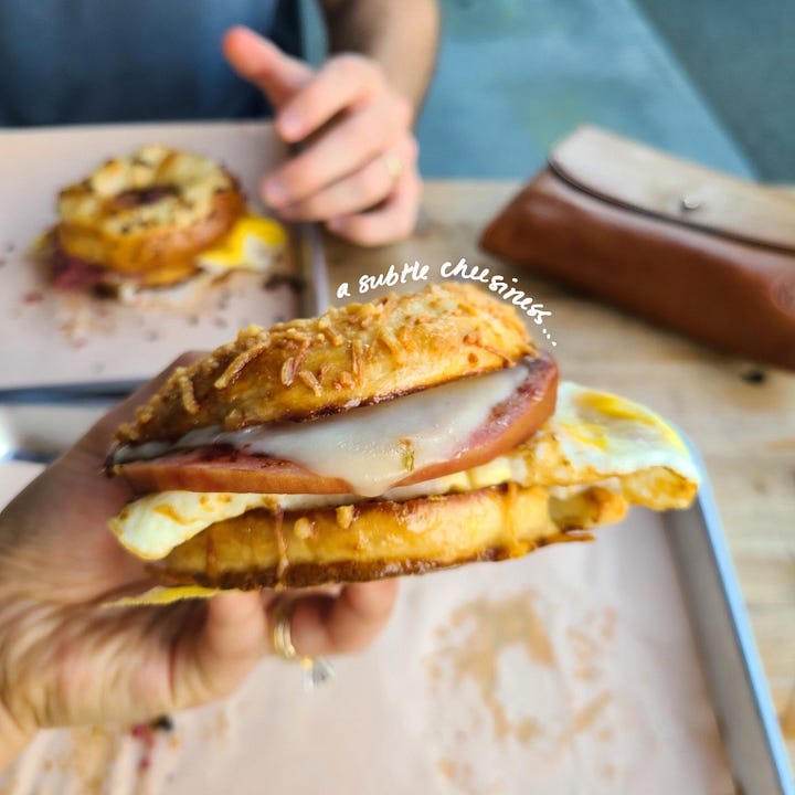 The Good Wurst Company Taylor Ham, Egg, Cheese on Asiago Cheese bagel