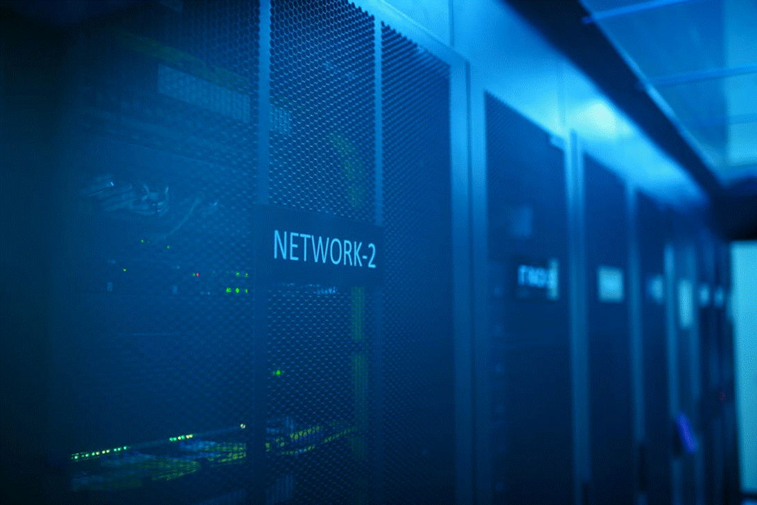 Title: Network rack in a data center - Description: A network rack in a data center environment, representing the convergence of federal health data systems and private contractor infrastructure.