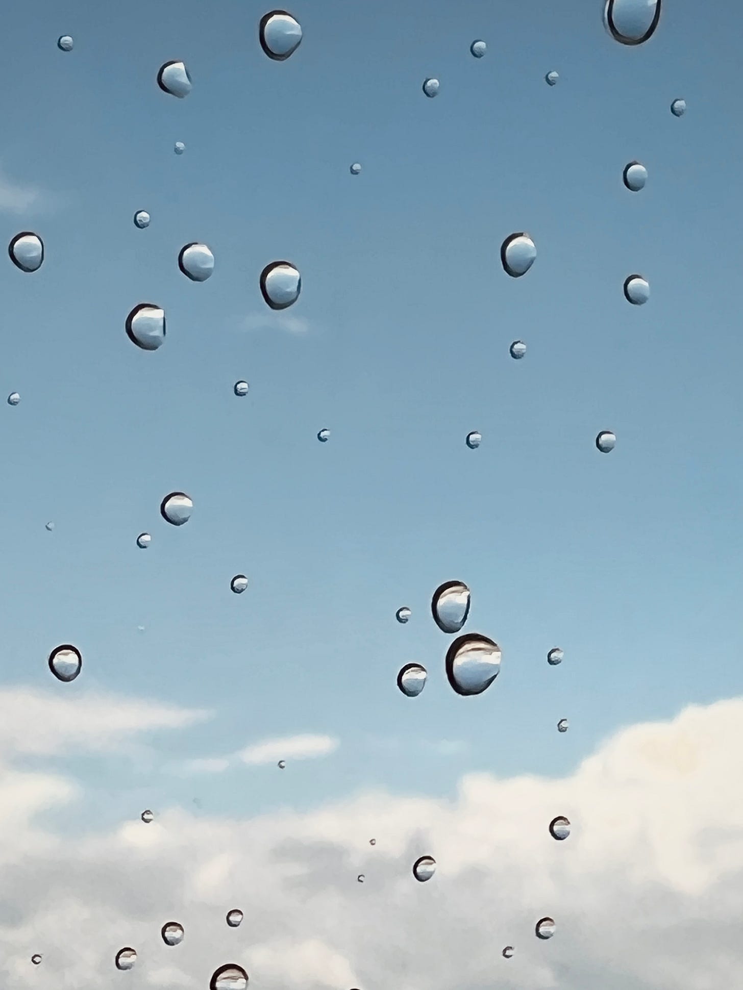 Raindrops on airplane window