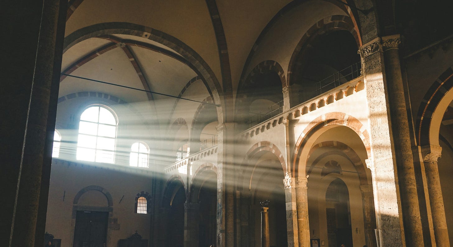 light shining into a dark church