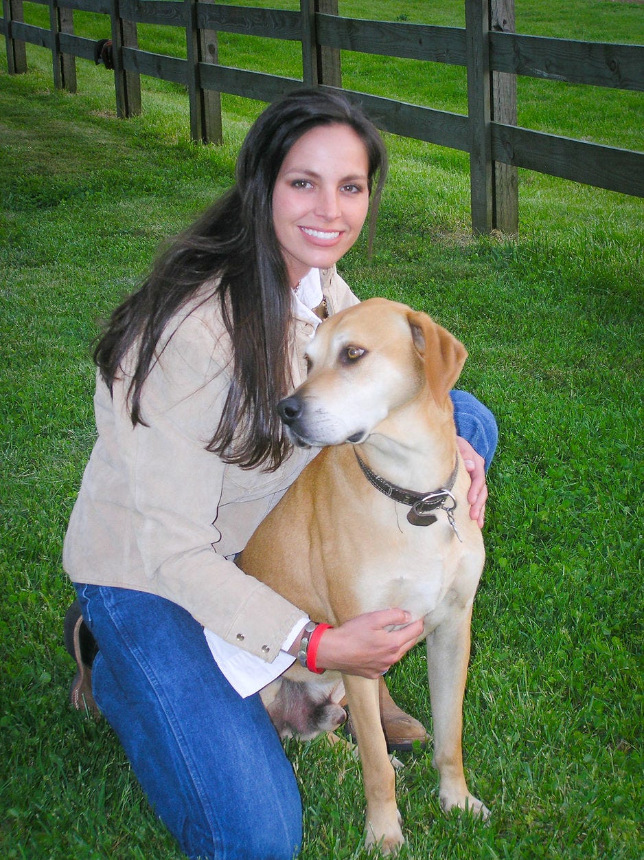 Joey Feek holding her dog Rufus in 2005