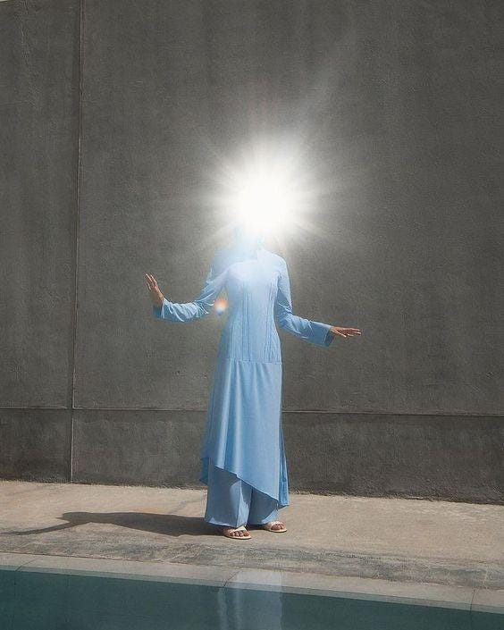 An image uploaded on Jul 13, 2023. May present: flash photography, standing, gesture, dress, performing arts.