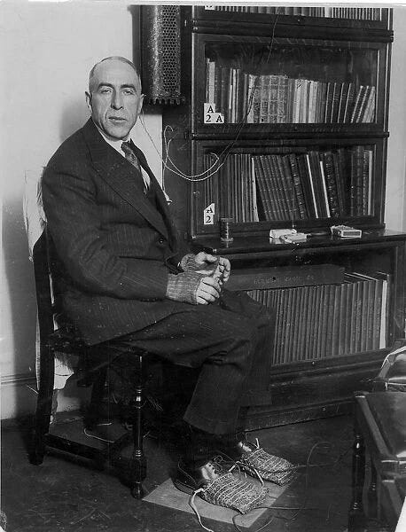 Photographs of Harry Price at Work. Full length photograph