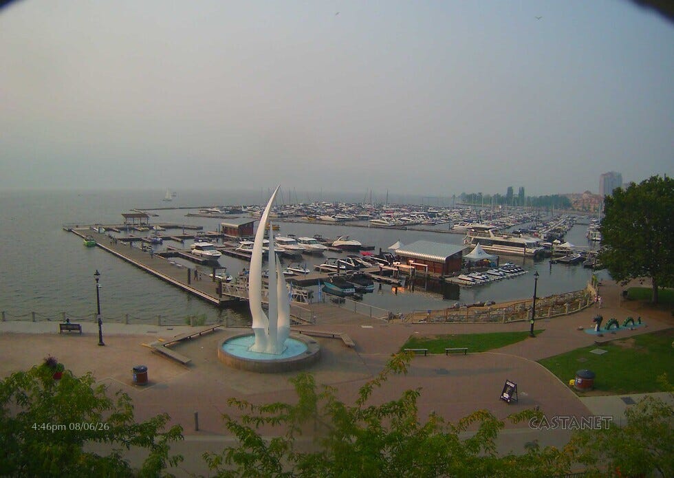 Live view of wildfire smoke across Okanagan Lake from the downtown sails