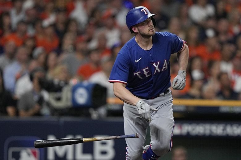 Texas Rangers&#8217; Mitch Garver hits a home run in October during the second inning of Game 6 of the baseball AL Championship Series in Houston. (David J. Phillip / AP)