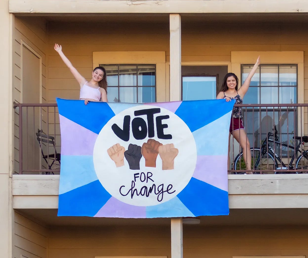 Changemakers with a “Vote for Change” sign. Changemakers with a “Vote for Change” sign.