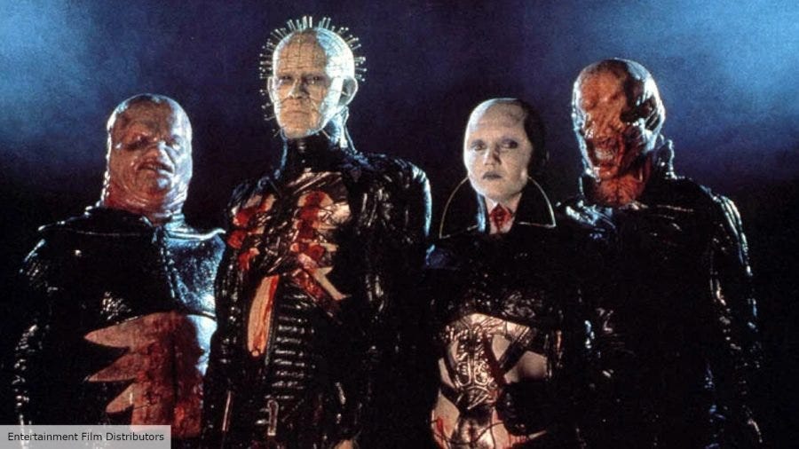 A group photo of the four original Cenobites, including "Butterball," The Priest, The Female, and The Chatterer.