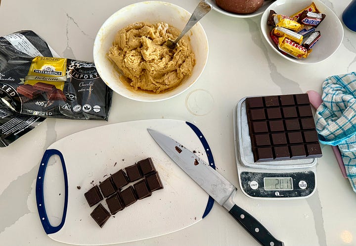Chopping up dark chocolate for cookies