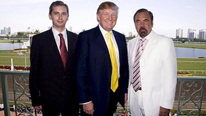 A group of men in suits

AI-generated content may be incorrect.