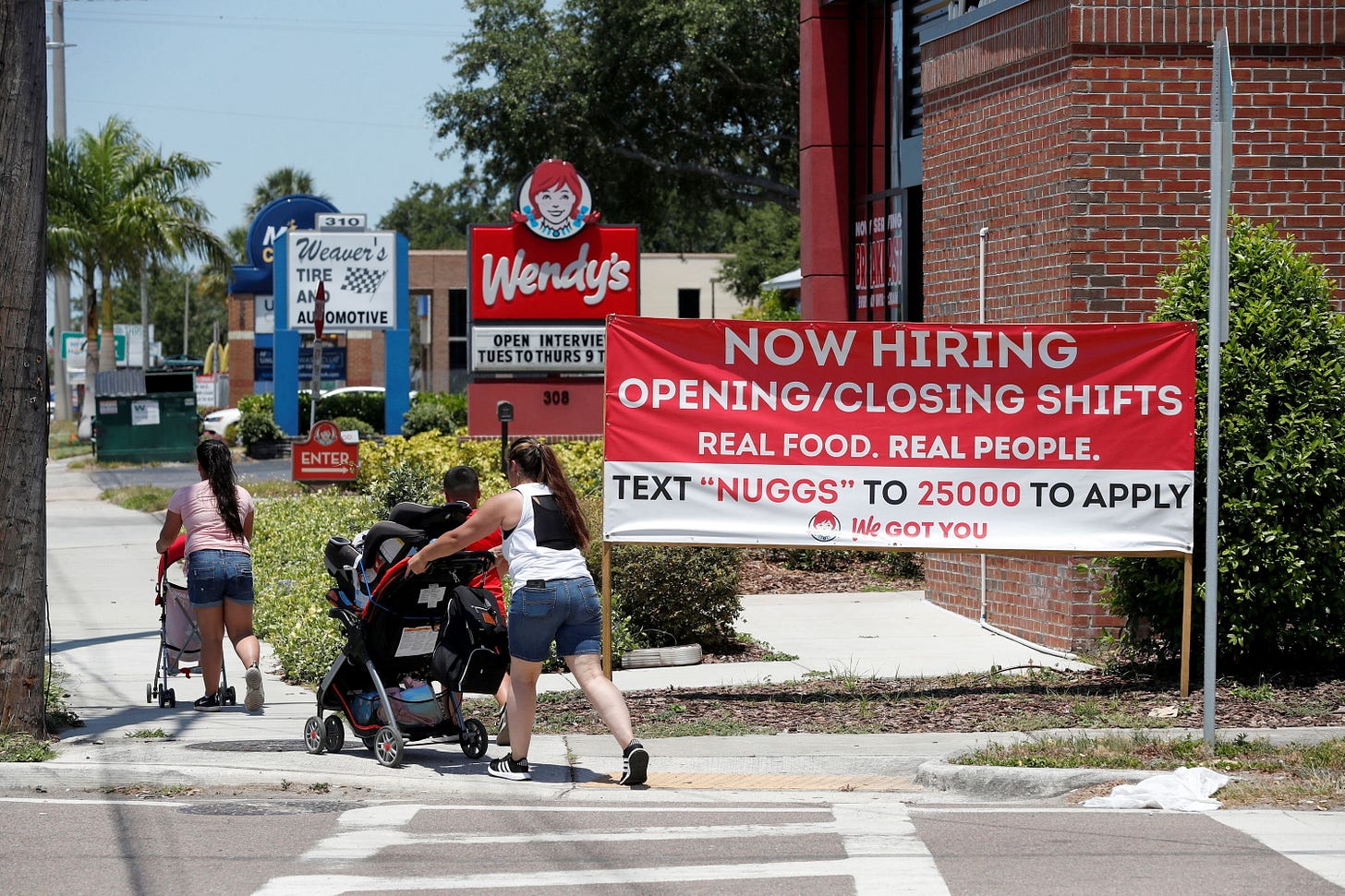 Amid hiring troubles, rising prices, U.S. growth gains speed -Fed | Reuters