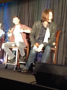 Jensen unbuttons his shirt...