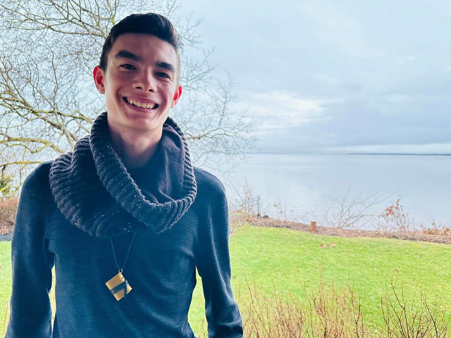 May be an image of 1 person and scarf