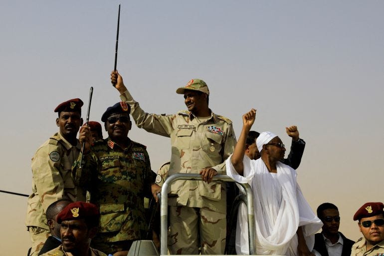 FILE PHOTO: Lieutenant General Mohamed Hamdan Dagalo, deputy head of the military council and head of paramilitary Rapid Support Forces (RSF), greets his supporters as he arrives at a meeting in Aprag village, 60 kilometers away from Khartoum, Sudan, June 22, 2019. REUTERS/Umit Bektas/File Photo FILE PHOTO: Lieutenant General Mohamed Hamdan Dagalo, deputy head of the military council and head of paramilitary Rapid Support Forces (RSF), greets his supporters as he arrives at a meeting in Aprag village, 60 kilometers away from Khartoum, Sudan, June 22, 2019. REUTERS/Umit Bektas/File Photo