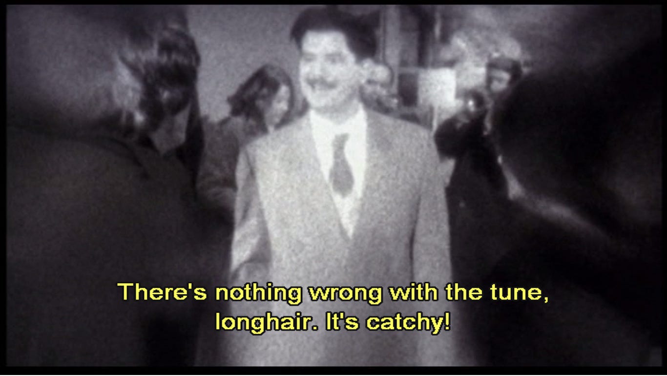 “There’s nothing wrong with the tune, longhair. It’s catchy!”