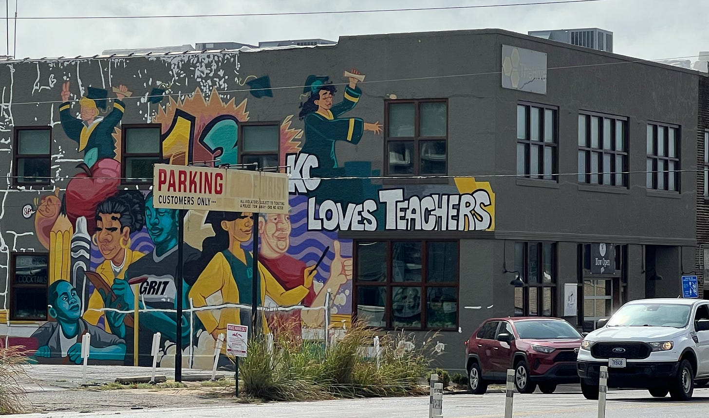 Graffiti that says "KC Loves Teachers."