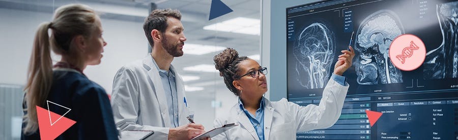 Doctors in lab coats are examining brain scans displayed on a large monitor, discussing the images. Doctors in lab coats are examining brain scans displayed on a large monitor, discussing the images.