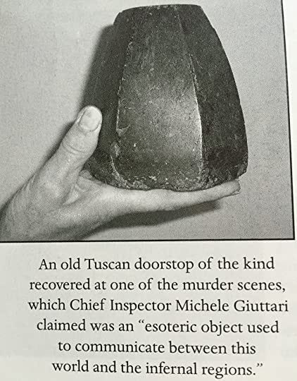 A palm sized, hexagonal-shaped rock-like doorstop