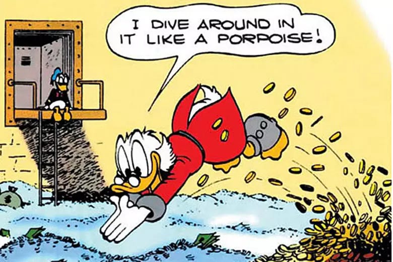 Scrooge McDuck dives into a sea of gold coins inside his private vault while an unnamed nephew watches on. Scrooge McDuck dives into a sea of gold coins inside his private vault while an unnamed nephew watches on.