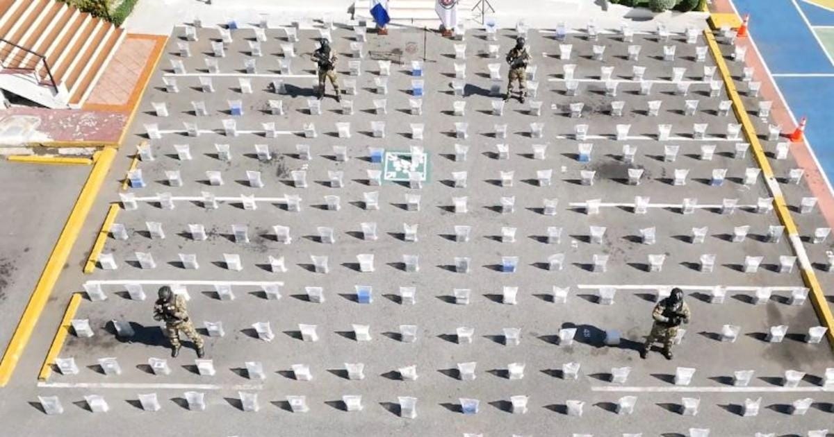 Dominican Republic soldiers guard 57 bales containing 1,670 packages of cocaine recovered from a “go-fast” smuggling boat recently captured by authorities there.