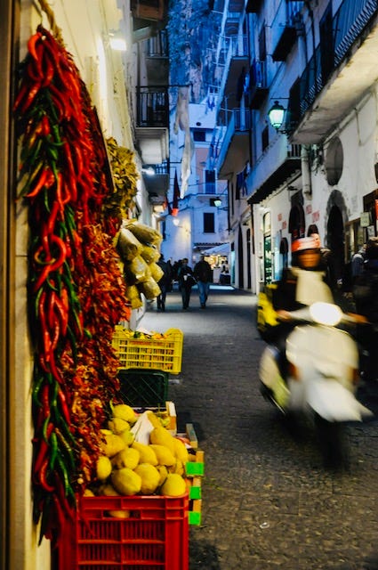 Top L-R: roadside produce outside Positano, Duomo d'Amalfi, cliffs and blue sea, spaghetti alle vongole, pepperoncini and limoni, pregnant Lolly in Amalfi, citron and lemons in our new bowl from Deruta, Deruta ceramics, flowery street trellises make natural shade