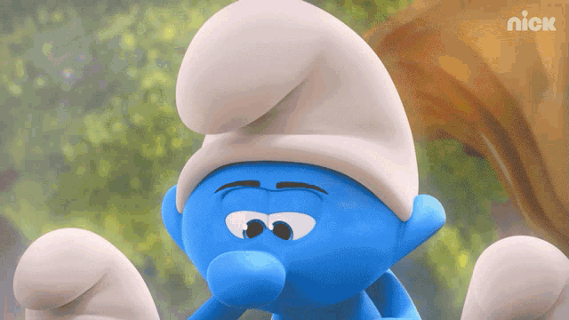a smurf with a white hat is shown on a nick screen a smurf with a white hat is shown on a nick screen