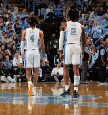 CHAPEL HILL, NC - FEBRUARY 25: Leaky Black #1, Armando Bacot #5, R.J. Davis #4 and Caleb Love #2 of the North Carolina Tar Heels walk away from the camera during a game against the Virginia Cavaliers on February 25, 2023 at the Dean Smith Center in Chapel Hill, North Carolina. North Carolina won 71-63. (Photo by Peyton Williams/UNC/Getty Images) CHAPEL HILL, NC - FEBRUARY 25: Leaky Black #1, Armando Bacot #5, R.J. Davis #4 and Caleb Love #2 of the North Carolina Tar Heels walk away from the camera during a game against the Virginia Cavaliers on February 25, 2023 at the Dean Smith Center in Chapel Hill, North Carolina. North Carolina won 71-63. (Photo by Peyton Williams/UNC/Getty Images)