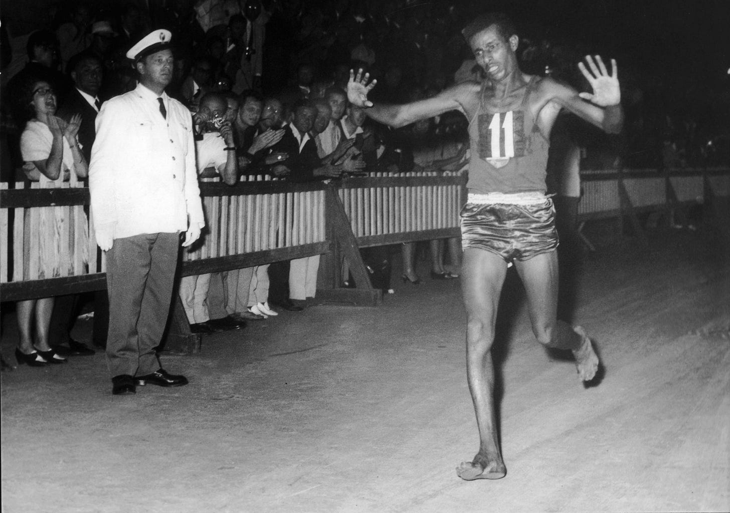 Olympic flashback: September 1960, a barefoot Bikila takes marathon gold Olympic flashback: September 1960, a barefoot Bikila takes marathon gold