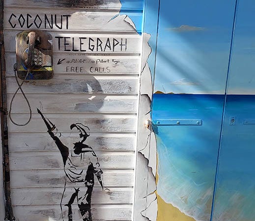A mural of the Coconut Telegraph on St. Barth, Caribbean