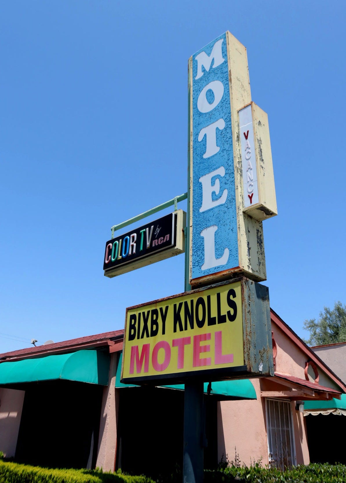 Photo of a classic Googie style sign for the Bixby Knolls Hotel in Long Beach, CA Photo of a classic Googie style sign for the Bixby Knolls Hotel in Long Beach, CA