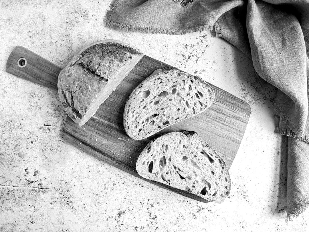 brown bread on brown wooden chopping board