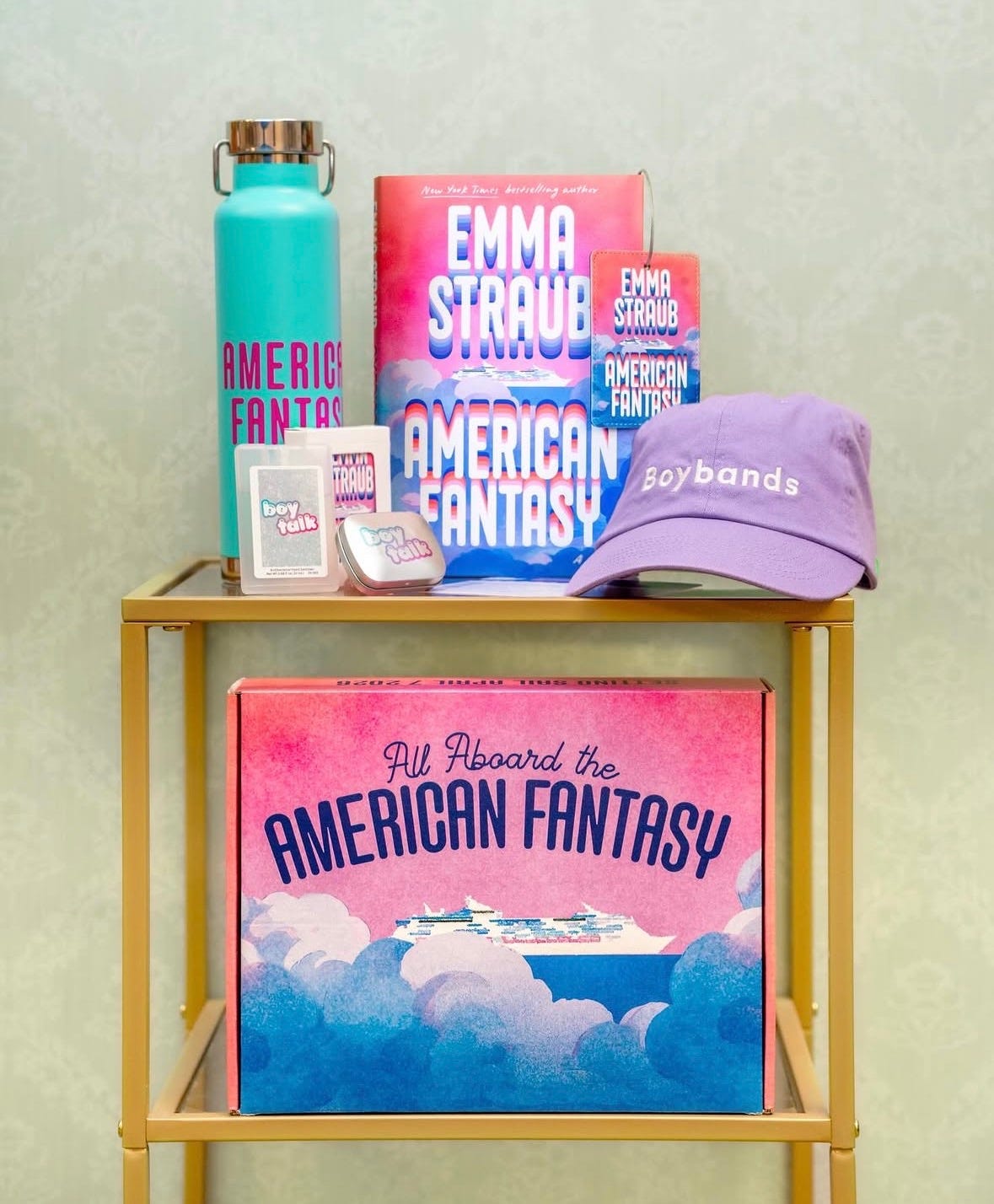 Emma Straub American Fantasy swag including water bottle hand sanitizer breath minds playing cards purple boybands baseball cap plus copy of the novel and promotional box Emma Straub American Fantasy swag including water bottle hand sanitizer breath minds playing cards purple boybands baseball cap plus copy of the novel and promotional box