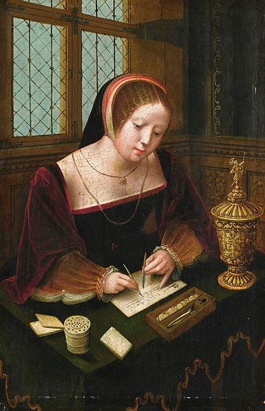 File:A lady writing at a desk.jpg
