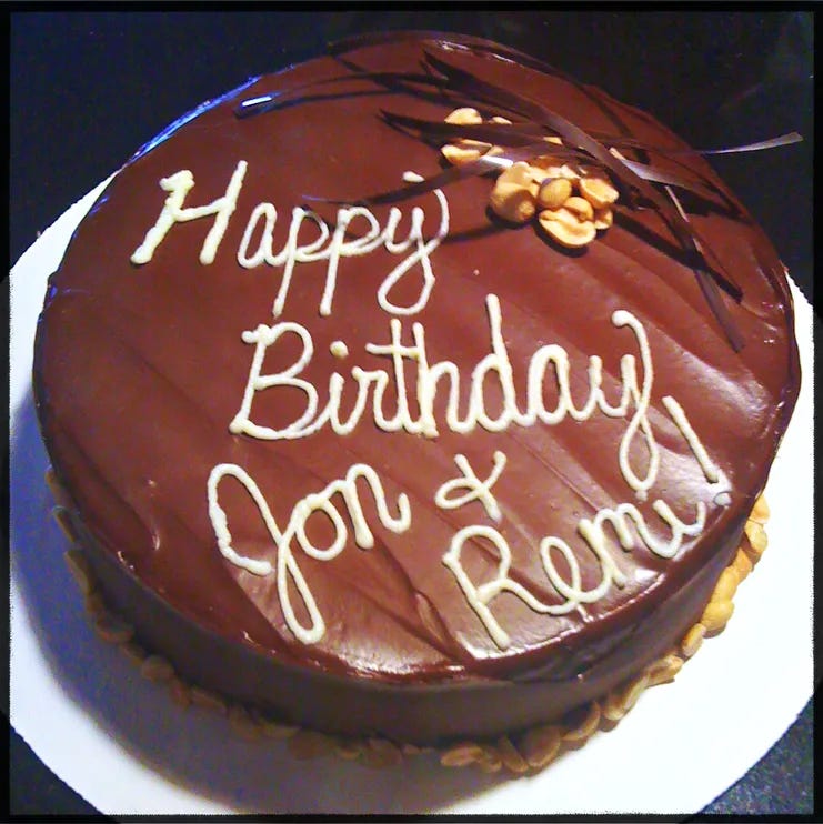 Cake that says Happy Birthday Jon + Remi!