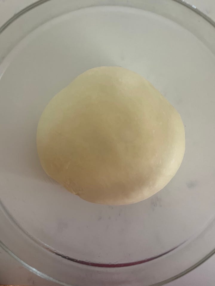 Two photos: one of the initial dough pre-rise and the second after the first rise where it's doubled in size