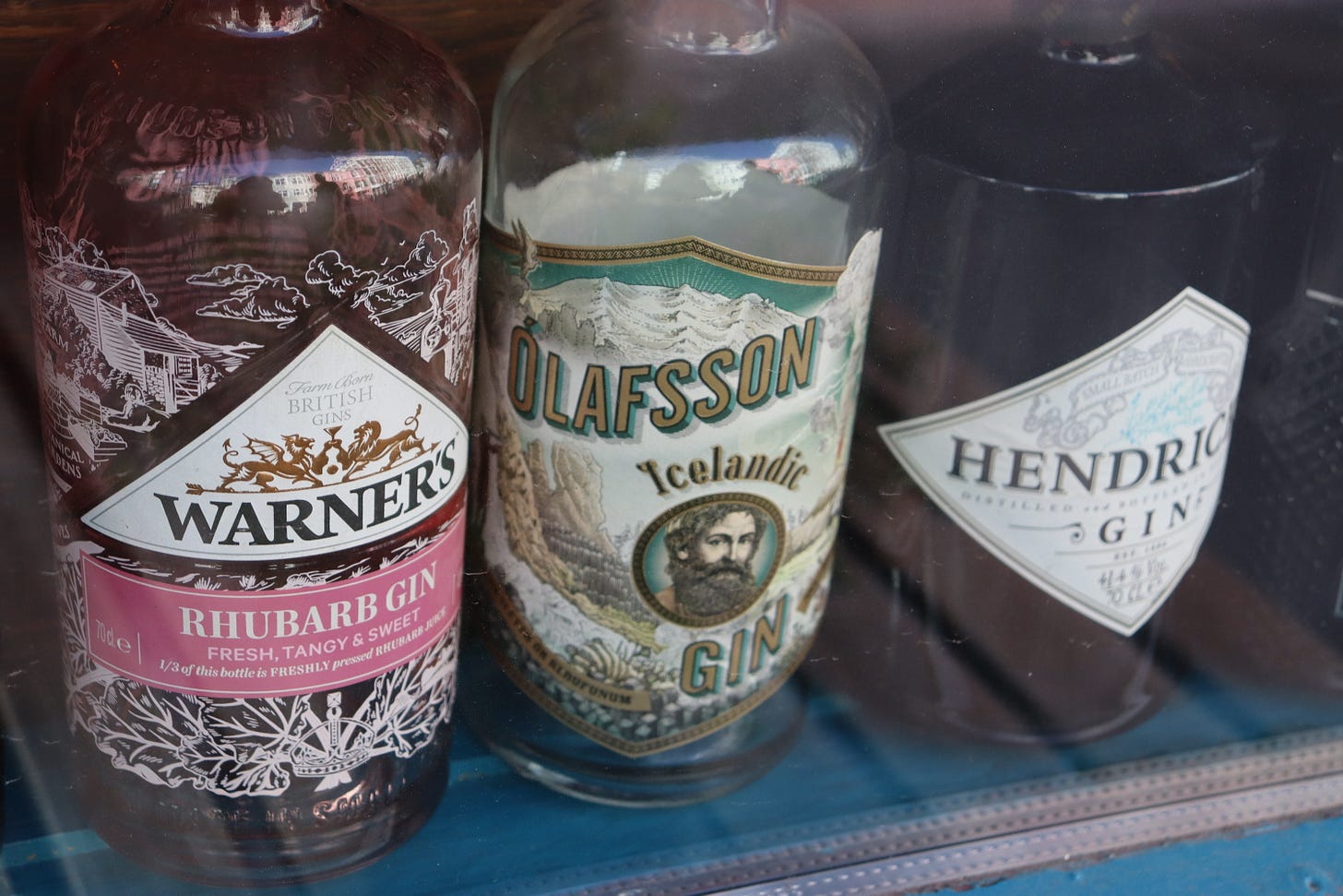 Bottles of gin in a pub window in Reykjavik, Iceland