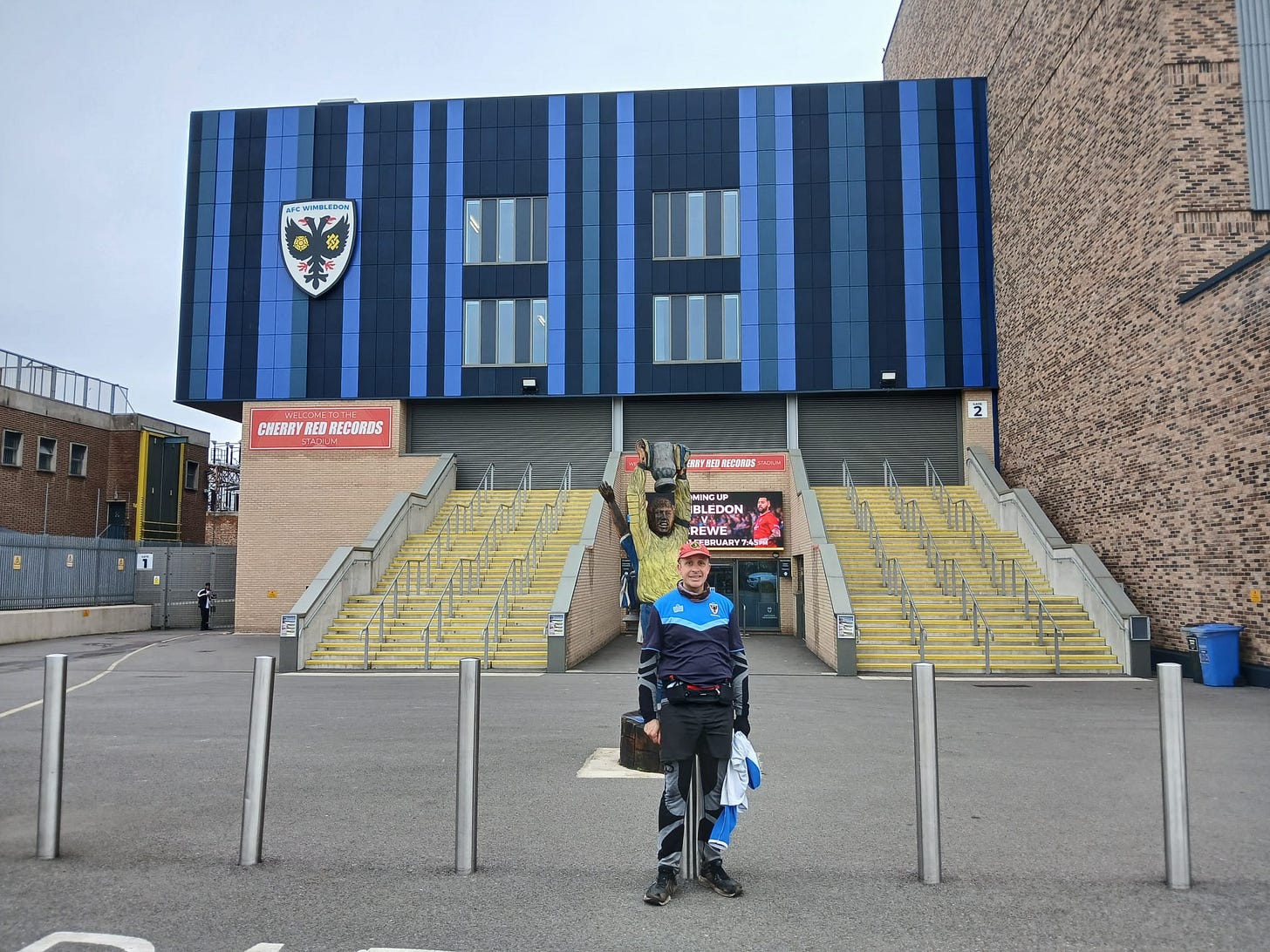 May be an image of 2 people and text