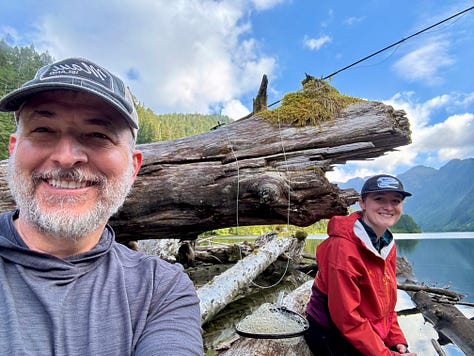 Me as a new father with my daughter, us in Alaska, and my whole family in Alaska