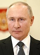 A person in a suit

Description automatically generated with medium confidence