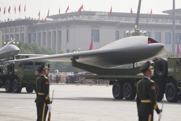 A GJ-11, stealth unmanned combat aerial vehicle takes part in a military parade to commemorate the 80th anniversary of Japan's World War II surrender held in front of Tiananmen Gate in Beijing, Wednesday, Sept. 3, 2025. (AP Photo/Andy Wong) A GJ-11, stealth unmanned combat aerial vehicle takes part in a military parade to commemorate the 80th anniversary of Japan's World War II surrender held in front of Tiananmen Gate in Beijing, Wednesday, Sept. 3, 2025. (AP Photo/Andy Wong)