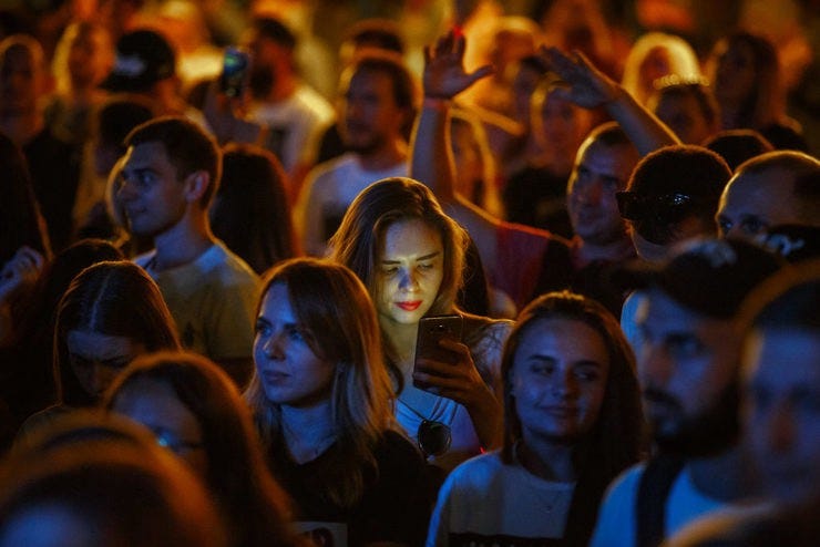Girl at concert shutterstock 1024x683