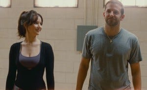 JENNIFER LAWRENCE and BRADLEY COOPER star in SILVER LININGS PLAYBOOK JENNIFER LAWRENCE and BRADLEY COOPER star in SILVER LININGS PLAYBOOK