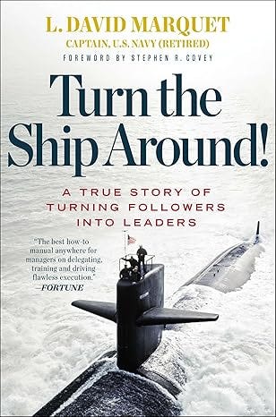 Book cover of Turn the Ship Around! by L. David Marquet, featuring a U.S. Navy submarine underway at sea.