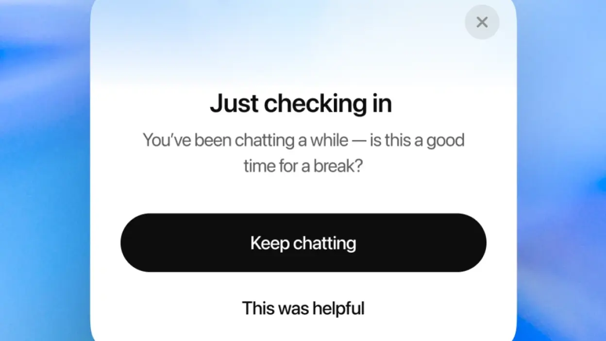 An example of a ChatGPT reminder. It reads "Just checking in. You've been chatting a while — is this a good time for a break?"
