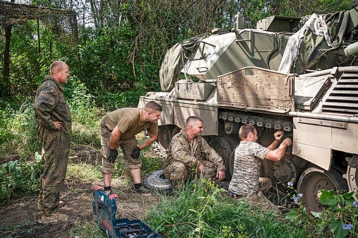 At left, a Leopard 1A5 at Rheinmetall's Ukraine facility. At right, the 44th Mechanized Brigade conducts field repairs on a Leopard 1A5. Via social media